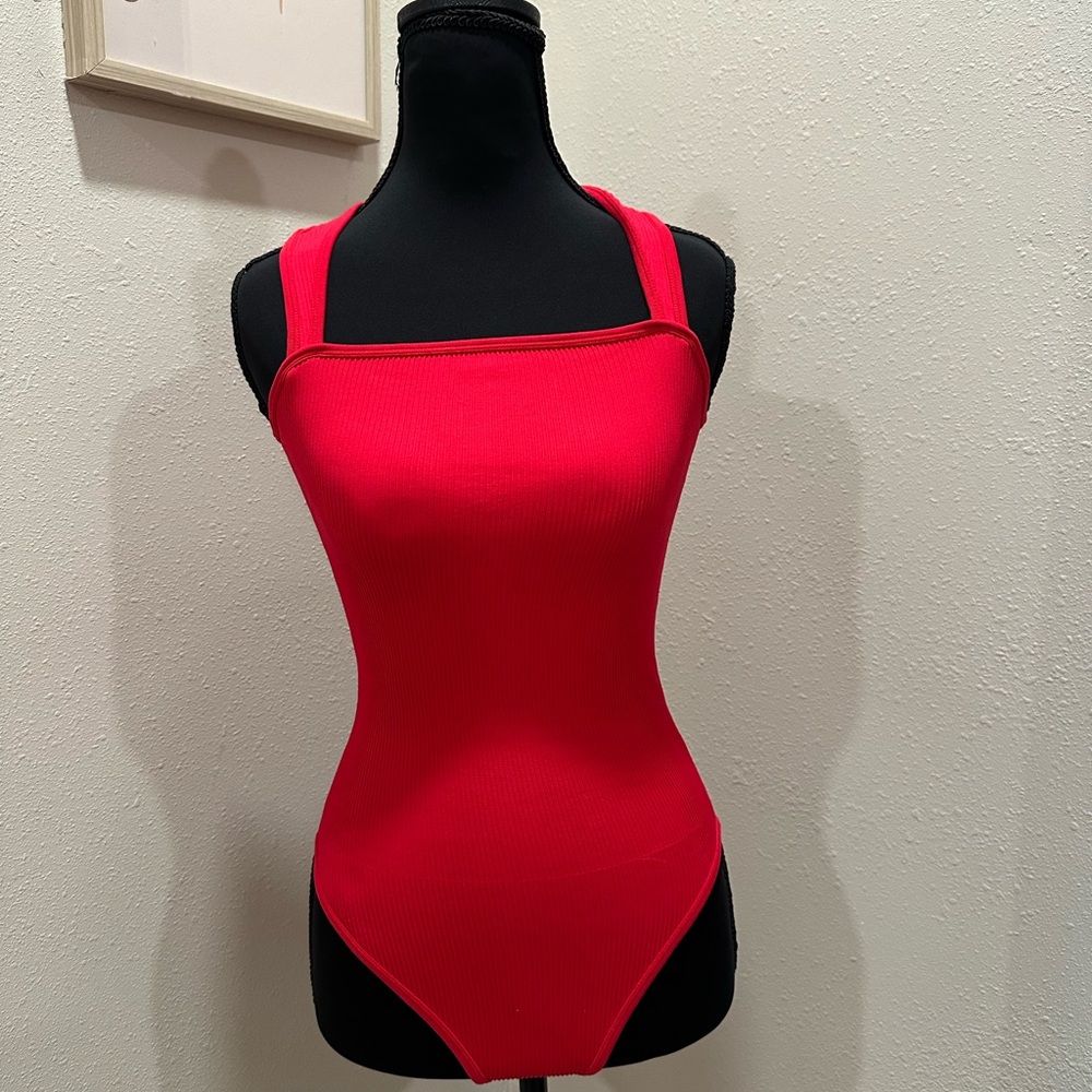 red bodysuit